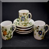 P73. Demitase set including 3 cups and 4 saucers. Handpainted. Made in Italy. - $16 